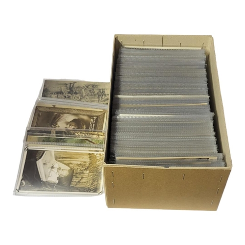 548 - A BOX CONTAINING APPROX 300 EARLY 20TH CENTURY POSTCARDS
Children, in individual transparent sleeves... 