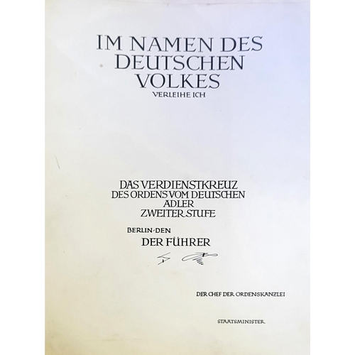 550 - A GERMAN WWII ARMY PRESENTATION DOCUMENT
Translates 'In the name of The German people I lend Tye Mer... 