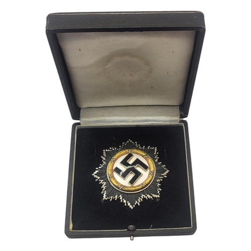 551 - A GERMAN WWII WAR ORDER OF THE GERMAN CROSS MEDAL (POSSIBLY VERY GOOD COPY)
Gold bezel with diamonds... 