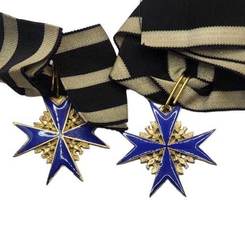 554 - TWO IMPERIAL GERMAN POUR LE MERITE MEDALS (POSSIBLY VERY GOOD COPIES)
Gilt ground with blue enamel, ... 