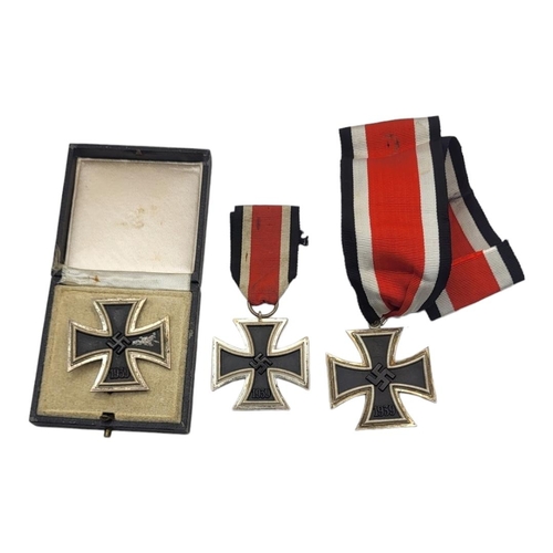 559 - A WWII GERMAN IRON CROSS MEDAL
Its class with pin back, marked ‘26’ for BH Mayer, in a fitted box, t... 