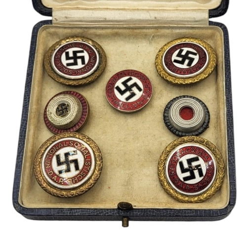 562 - A COLLECTION OF FOUR WWII GERMAN NATIONAL SOCIALIST ENAMEL BADGES
Red white and black enamel marked ... 