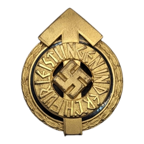 563 - A WWII GERMAN HITLER YOUTH LEADER'S  GOLDEN SPORTS BADGE 
Embossed 'Fur Leistungen in Der Ch RZ’ mar... 