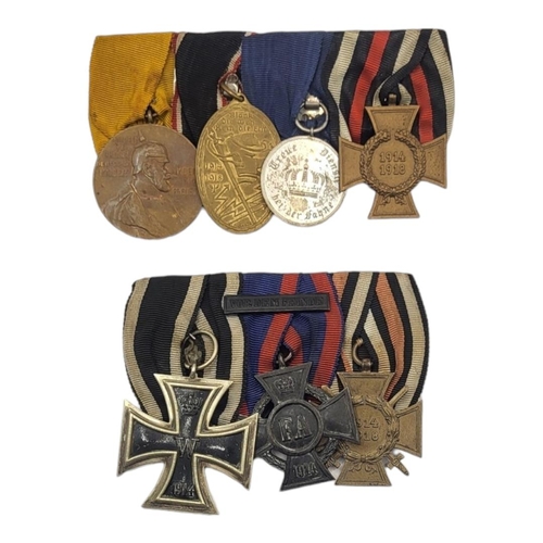 576 - TWO WWI GERMAN MEDAL GROUPS
To include a trio of medals 1914 iron cross, Duchy of Oldenburg Friedric... 