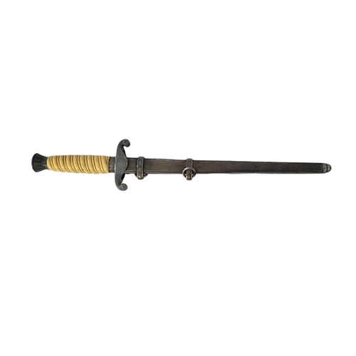 594 - A GERMAN WWII HEER OFFICERS DAGGER AND SCABBARD BY W.K.C., SOLIGEN.
(blade 26.5cm, overall 37.5cm)

... 