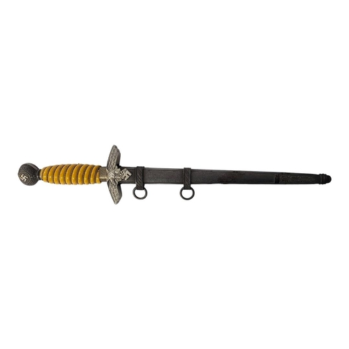 595 - F.W. HOLLER, A GERMAN WWII 2ND PATTERN LUFTWAFFE DAGGER AND SCABBARD.
(blade 26.1cm, overall 38.4cm)... 