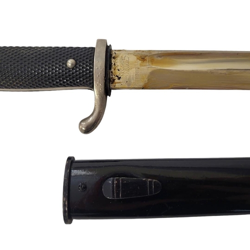 596 - A GERMAN WWII ARMY PARADE BAYONET AND BLACK PAINTED 
By Tiger, Solingen.
(blade 24.5cm, overall 37cm... 