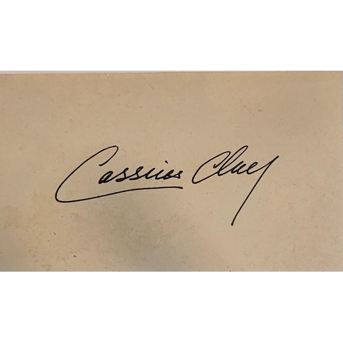 610A - CASSIUS CLAY (MUHAMMAD ALI), AN ORIGINAL PEN ON CARD AUTOGRAPH 
Hand signed in The Olympic Year of 1... 