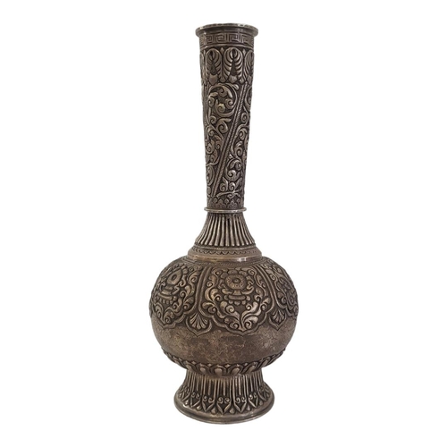 276A - A 19TH CENTURY ASIAN WHITE METAL ROSE WATER BOTTLE/VASE
Having fine embossed and chased decoration a... 