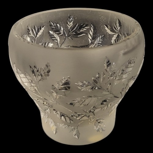 281A - LALIQUE, A VINTAGE  FROSTED GLASS CANDLE HOLDER
Having embossed leaf design, engraved mark to base, ... 