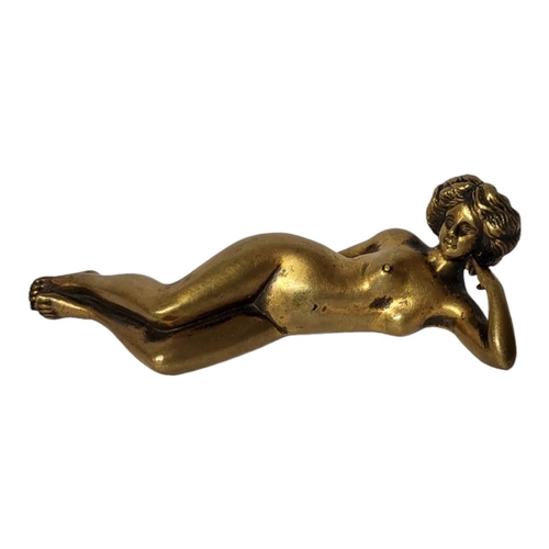 388 - A LATE 19TH CENTURY CONTINENTAL CAST BRONZE EROTIC BELL PUSH MODELLED AS A NUDE FEMALE FIGURE AT RES... 