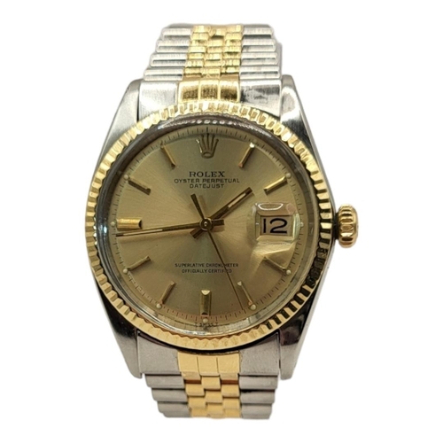 14 - ROLEX, DATEJUST, A VINTAGE 18CT GOLD AND STEEL GENT’S WRISTWATCH
Gold tone dial with calendar window... 