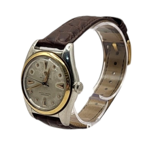 16 - ROLEX, OYSTER, A VINTAGE STAINLESS STEEL BUBBLEBACK GENT’S WRISTWATCH
Having a gold bezel, silver to... 