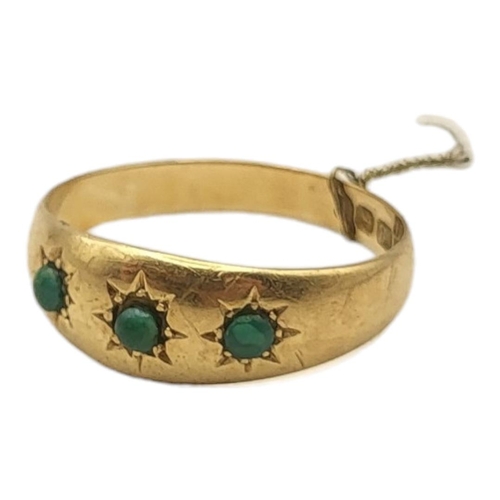 16A - AN EARLY 20TH CENTURY 18CT GOLD AND TURQUOISE THREE STONE RING
Three stones in a rubover setting.
(s... 