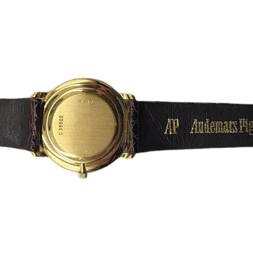 17 - AUDEMARS PIGUET, A VINTAGE 18CT GOLD GENT’S WRISTWATCH
Silver tone dial with calendar date window an... 