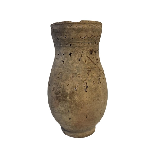 201A - AN 18TH/19TH CENTURY EARTHENWARE PITCHER IN STYLE OF CYPRO-ARCHAIC PERIOD
With light brown malt mono... 