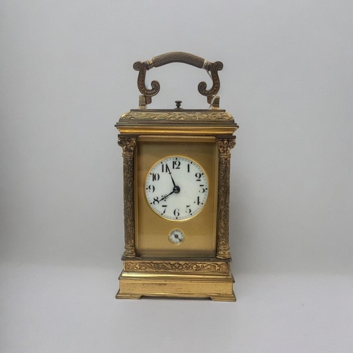 220B - A 19TH CENTURY GILT BRASS GRANDE SONNERIE CARRIAGE CLOCK
Having a single carry handle, bevelled glas... 