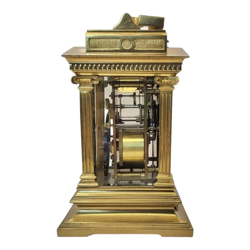 224B - A 19TH CENTURY GILT BRASS REPEATER CARRIAGE CLOCK
Architectural form with column supports, blue porc... 