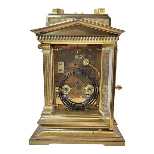 224B - A 19TH CENTURY GILT BRASS REPEATER CARRIAGE CLOCK
Architectural form with column supports, blue porc... 