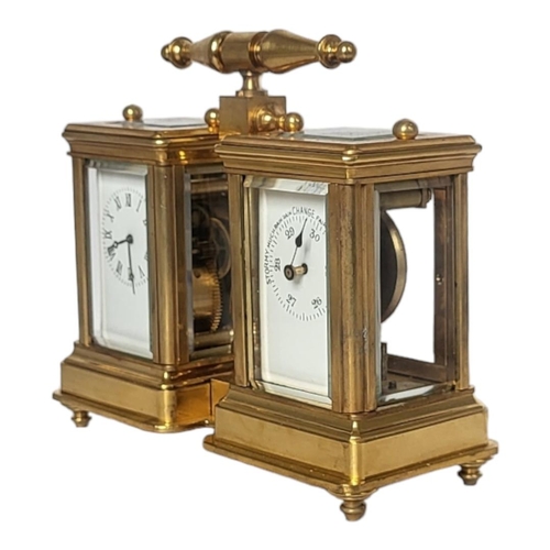 225 - A 19TH CENTURY STYLE GILT BRONZE DOUBLE CARRIAGE CLOCK
Two adjacent bevelled glass panels reveal clo... 