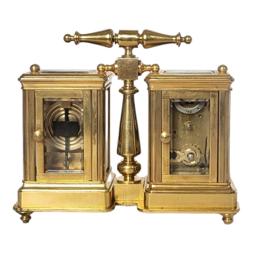 225 - A 19TH CENTURY STYLE GILT BRONZE DOUBLE CARRIAGE CLOCK
Two adjacent bevelled glass panels reveal clo... 