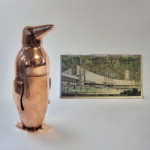 226 - A LATE 20TH CENTURY COPPER COVERED NOVELTY COCKTAIL SHAKER IN DECO MANNER FORMED AS A PENGUIN 
With ... 