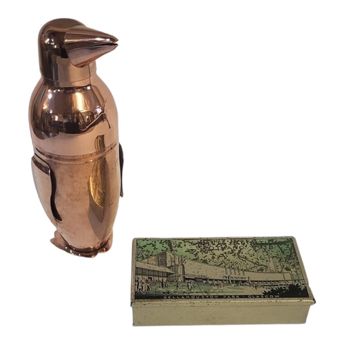 226 - A LATE 20TH CENTURY COPPER COVERED NOVELTY COCKTAIL SHAKER IN DECO MANNER FORMED AS A PENGUIN 
With ... 