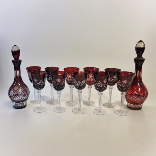 226A - A BOHEMIAN FLASH CUT RUBY GLASS DRINKING SET
To include two decanters and stoppers and ten large win... 