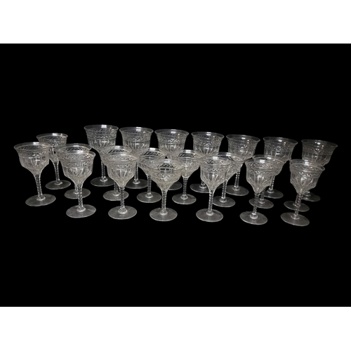 228A - A LATE EDWARDIAN FINE COLLECTION OF TWENTY-THREE WINE AND SHERRY GLASSES
All with facet cut bowls, i... 