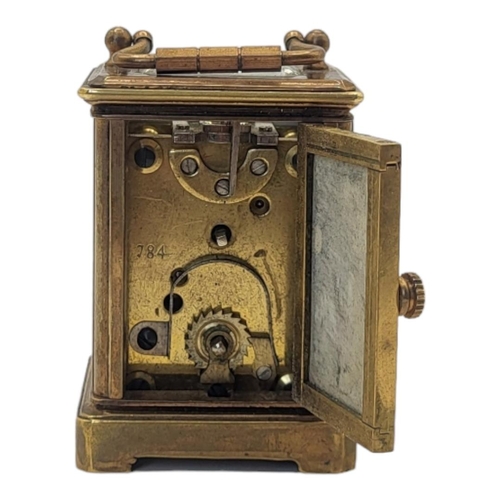 229 - A MINIATURE SÈVRES STYLE FRENCH PORCELAIN AND POLISHED BRASS CARRIAGE CLOCK
Having a glass top with ... 