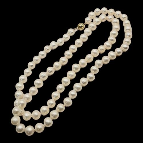 22A - A VINTAGE CONTINENTAL 14CT GOLD AND PEARL NECKLACE
Having a single strand with spherical 14ct gold c... 