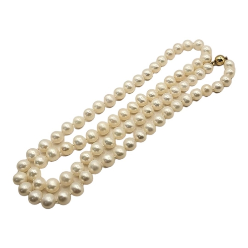 22A - A VINTAGE CONTINENTAL 14CT GOLD AND PEARL NECKLACE
Having a single strand with spherical 14ct gold c... 