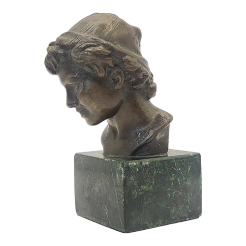 233 - AFTER JULES DALOU, 1838 - 1902, A BRONZE BUST OF AN ITALIAN ADOLESCENT BOY
On green faux marble base... 