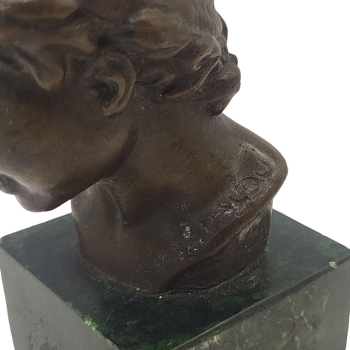 233 - AFTER JULES DALOU, 1838 - 1902, A BRONZE BUST OF AN ITALIAN ADOLESCENT BOY
On green faux marble base... 