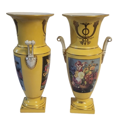 247 - A PAIR OF YELLOW SEVRÈS STYLE CERAMIC VASES
Gilt edging and panels with floral imagery on a tapering... 