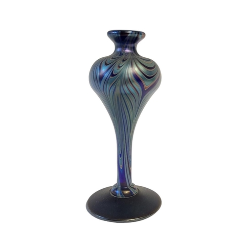 256 - A 20TH CENTURY ART GLASS VASE
Globular form with iridescent decoration, engraved mark to base.
(appr... 