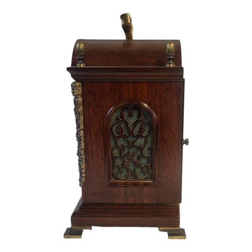 266A - WARMINK, A 20TH CENTURY MAHOGANY AND BRASS MANTEL CLOCK
Single brass handle with acorn finials and b... 