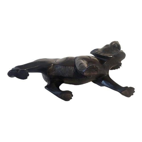 277 - A MEIJI STYLE BRONZED TIGER FIGURE
Having indented groove decoration marking its stripes. 
(9cm x 26... 