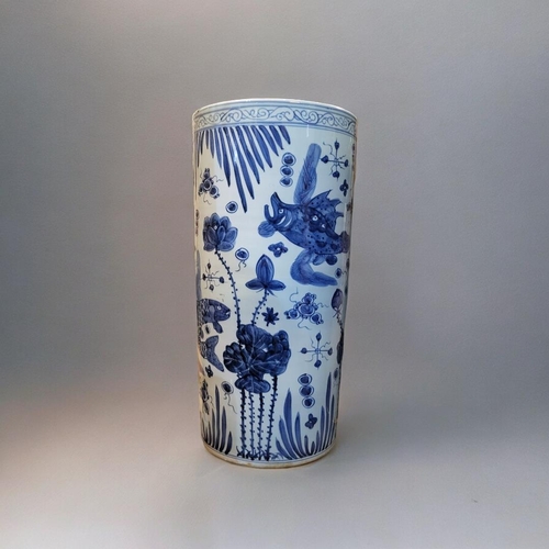 282 - A TALL CHINESE BLUE AND WHITE CERAMIC CYLINDRICAL UMBRELLA STAND
Decorated with aquatic life and fau... 