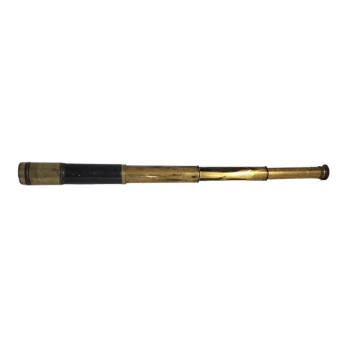 284 - A 19TH CENTURY BRASS AND LEATHER TELESCOPE 
Three pull out and lens shade,black leather mount and ou... 