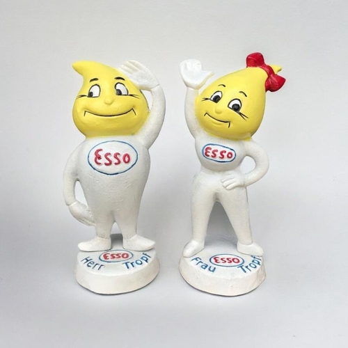 285 - A PAIR OF NOVELTY CAST IRON ESSO MONEY BANK FIGURINES
Titled ‘Abby Slick’ & ‘Andy Slick’, with embos... 