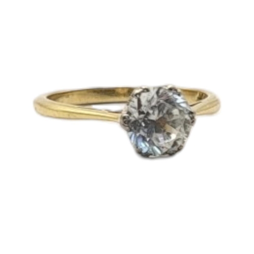 29 - A VINTAGE 18CT GOLD AND QUARTZ SOLITAIRE RING
The single round cut stone in a plain design.
(size J)... 