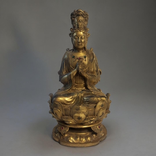 290 - A GILT BRONZE FIGURE OF TARA
In the manner of Qing Dynasty, wearing a jewelled dhoti beaded necklace... 