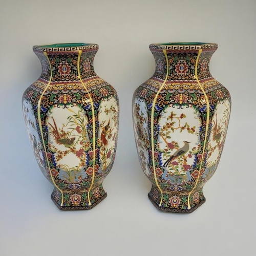 292 - A PAIR OF CHINESE STYLE FAMILLE VERTE HEXAGONAL BALUSTER VASES
With floral decoration and stylised b... 