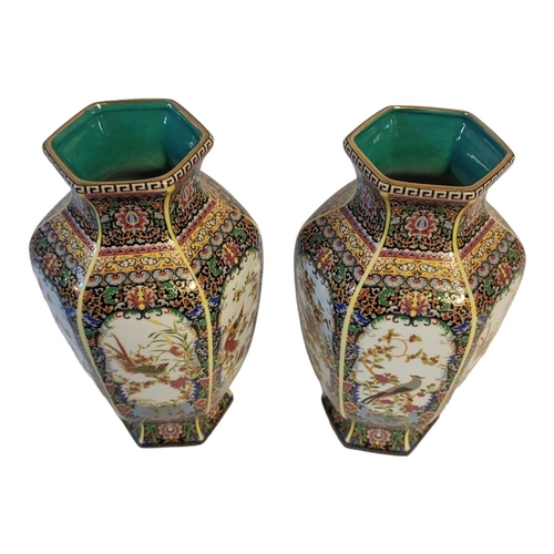 292 - A PAIR OF CHINESE STYLE FAMILLE VERTE HEXAGONAL BALUSTER VASES
With floral decoration and stylised b... 