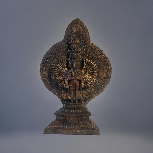 296 - A TIBETAN BRASS STATUE OF AVALOKITESVARA (GUANYIN), the thousand arm deity, with removable ornate ba... 