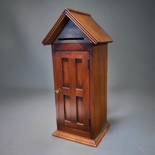 305 - AN EARLY 20TH CENTURY STYLE MAHOGANY LETTER BOX
With reeded fascia above a brass trim and lockable p... 