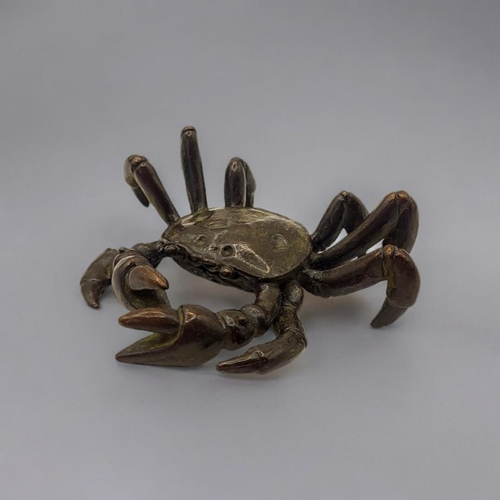 318 - A JAPANESE STYLE BRONZE FRESHWATER CRAB
With impressed logographic characters to base.

Condition: g... 