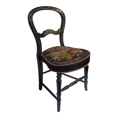 337 - A MID VICTORIAN PAPIER-MACHE AND MOTHER OF PEARL INLAID AND EBONISED BALLOON BACK CHILD'S CHAIR
With... 