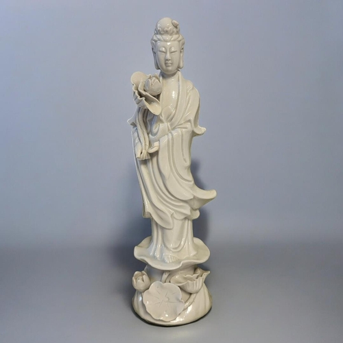 340 - A LATE 19TH CENTURY CHINESE QING DYNASTY BLAC DE CHINE FIGURE OF GUANYIN, THE GODDESS OF MERCY
Stand... 